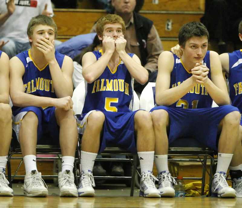 John Roberts at the line for a foul shot to send the Class B state final to overtime … and the players on the Falmouth bench? Brendan McDonnell’s expression said it all.