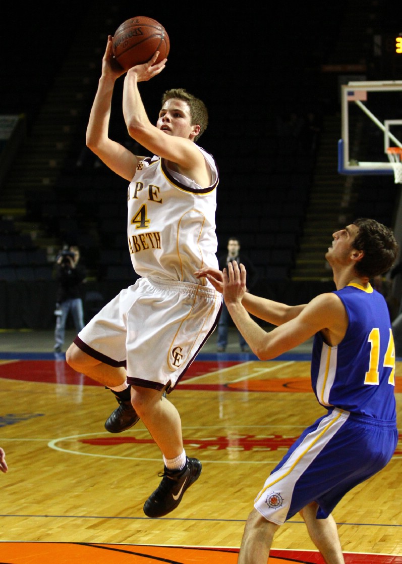 Jahrel Registe goes up for a shot against Ben Brewster.