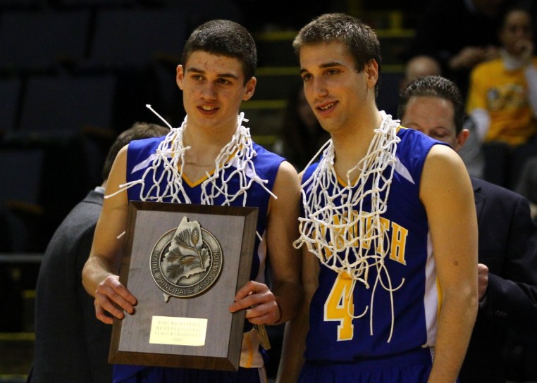 Stefano Mancini shoots a jumper over Tanner Garrity. Mancini finished with 24 points.