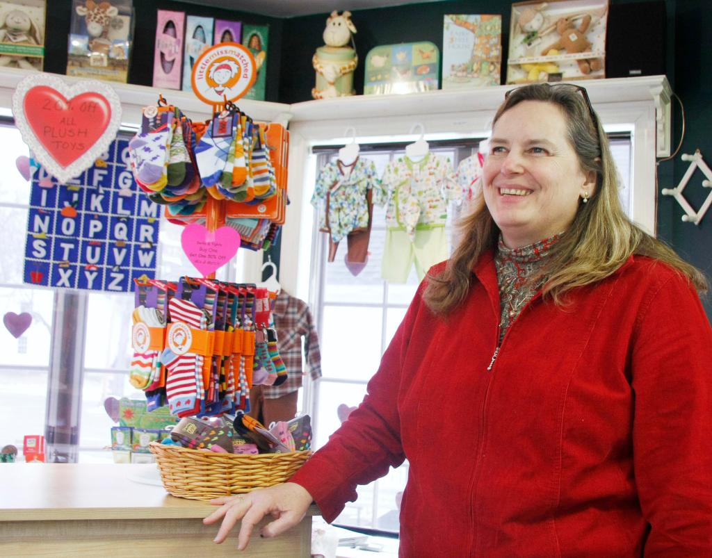 Jill Brady/Staff Photographer: Bonnie Tahan, owner of Little Red Wagon in Kennebunk's Lower Village, talks about the proposed TIF district and where she'd like to see funds used for improvements.