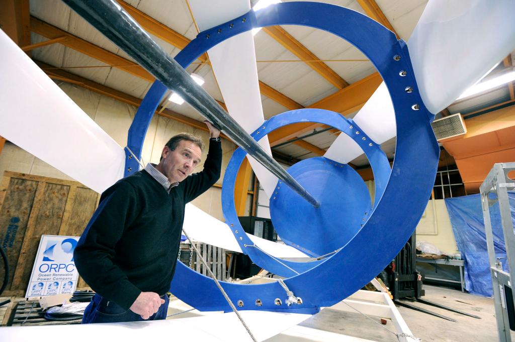 John Ferland, vice president of project development with Ocean Renewable Power Co., stands inside one of the all-composite turbines that will be installed off the waters of Eastport. The upcoming test of the turbine, he said, is “like a Broadway debut”: It needs to generate momentum for the project.