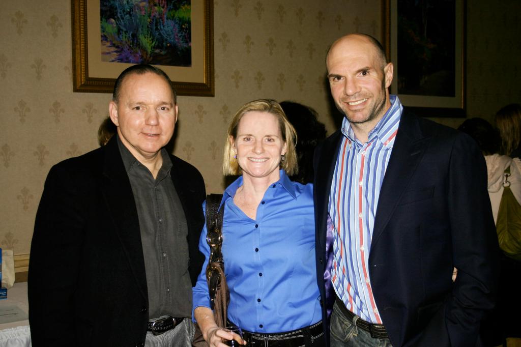 Pirates Owner/CEO Brian Petrovek, his wife, Sara Petrovek, and assistant coach Eric Weinrich.