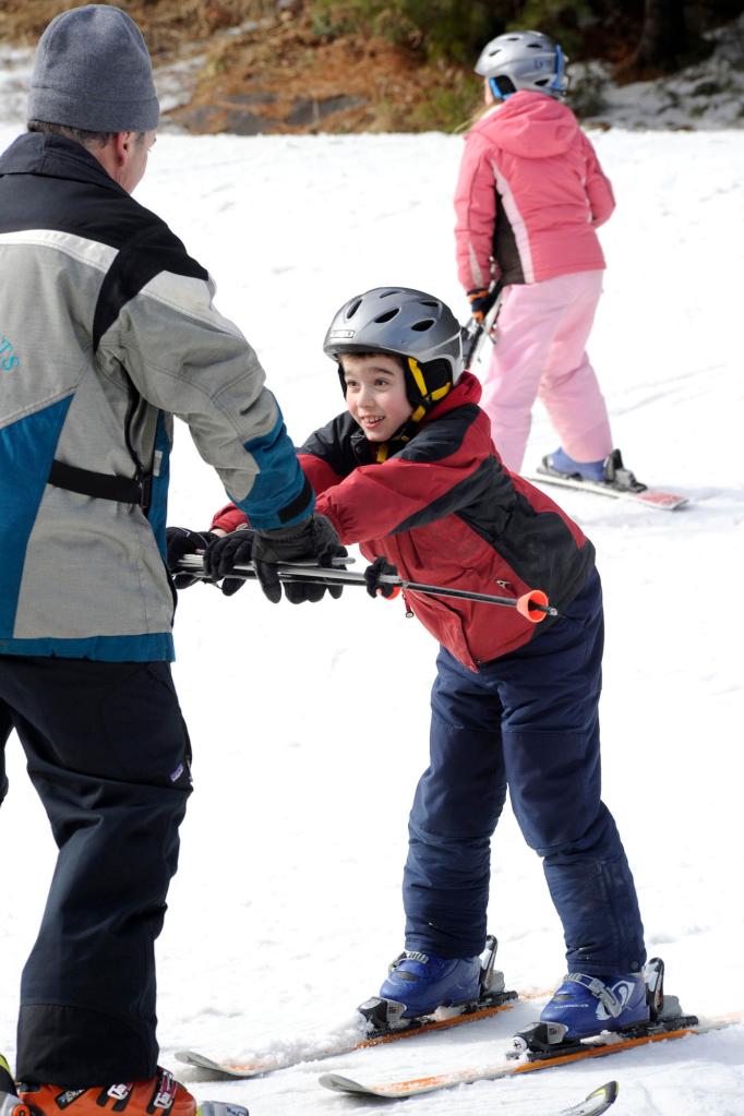 Far left: Ski instructor Michael Cyr and Peter Sachs.