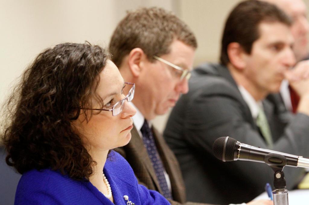 Mila Kofman, Maine’s superintendent of insurance, listens to concerns during a public hearing on Anthem’s request for a 23 percent premium increase for individual policies at a hearing in Augusta on Monday.