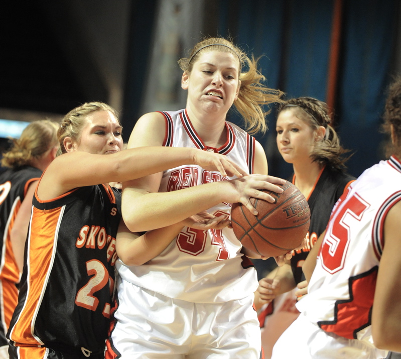 Scarborough's Brittany Bona pulls a rebound away from Jaimi Poland.