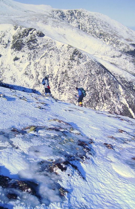 Peter Arsenault, left, has learned to contend with the challenges offered by climbing Mount Washington. He’s done it 100 times in the last 20 years, including more than 60 times against the winter weather.