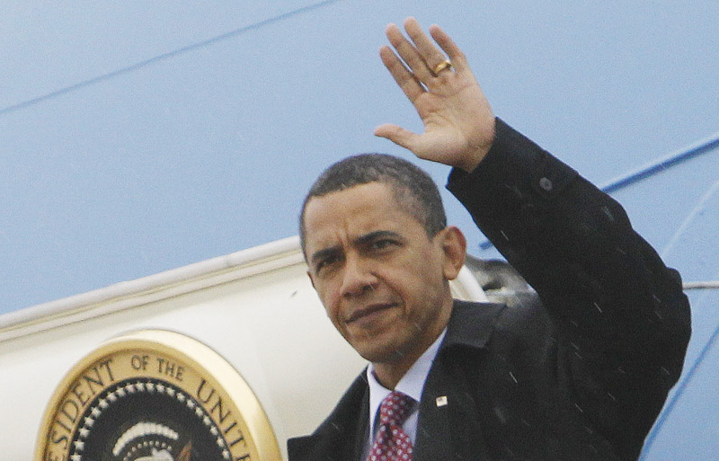 President Barack Obama steps off Air Force One at Andrews Air Force Base, Md., on Monday after returning from a secret trip to Afghanistan.