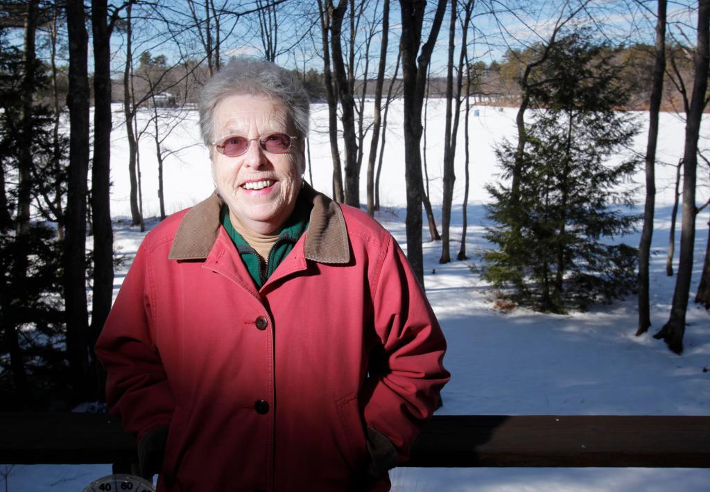 Pat Baldwin, who lives on Mousam Lake, in background, jump-started efforts to fight pollution and was given a lifetime achievement award from the EPA for her work.