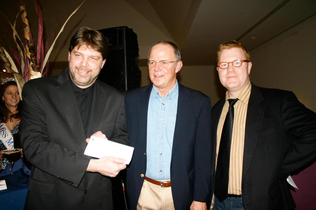 Winning bartender Tom Laslavic of Natalie's Restaurant with Bob Harkins of Cold River Vodka and Jim Britt of gBritt PR.