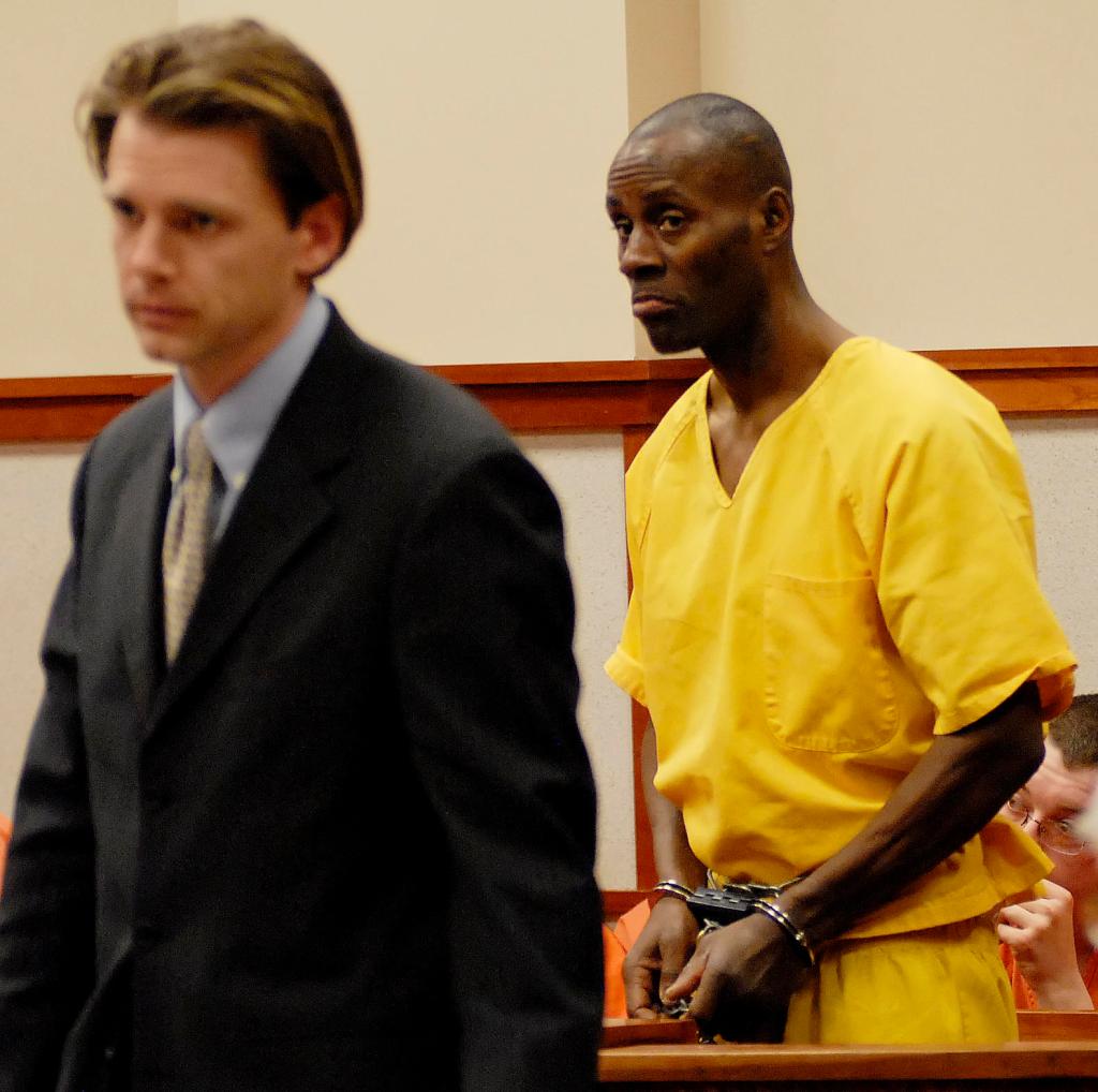 Ephriam Bennett looks to his attorney Merritt Heminway during his initial appearance at Cumberland County Superior Court this week.
