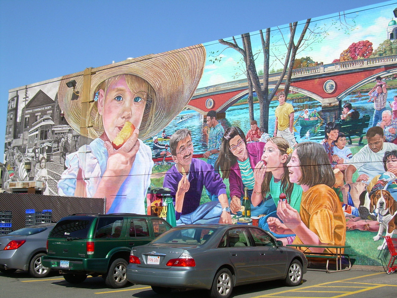 The parking lot was full and a steady stream of customers filed in and out when reporter Meredith Goad visited the Trader Joe’s in Cambridge, Mass. A vivid mural of scenes around Cambridge adorns one side of the store.