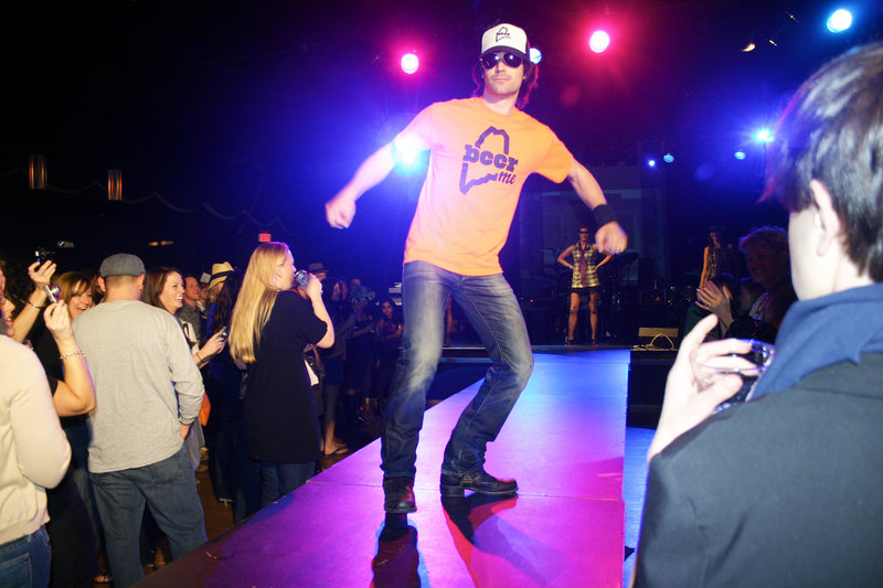 Chris Avantaggio models a T-shirt from his BeerME line.