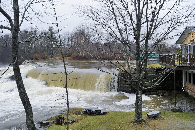 The dam off East Elm Street borders a home on Melissa Drive and serves mainly as an impoundment, keeping river levels high in the summer.