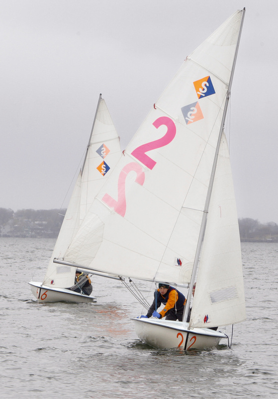 Portland High School freshman Patrick Robinson competes in the Bulldog Classic Regatta in Casco Bay in Portland on Saturday. Steering the boat but not shown is senior Parker Robinson.