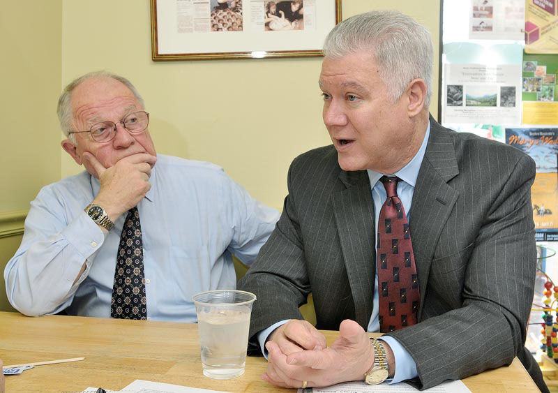 John Richardson, Democratic candidate for governor of Maine, explains what happened leading up to being denied Clean Election funding. He sits with friend F. Lee Bailey as he talks to a reporter in Brunswick.