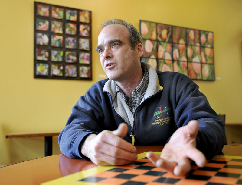 Sitting in one of his businesses, Market House Coffee in Monument Square, Bill Milliken talks about President Obama’s plans to mention him in a speech at the Portland Expo.