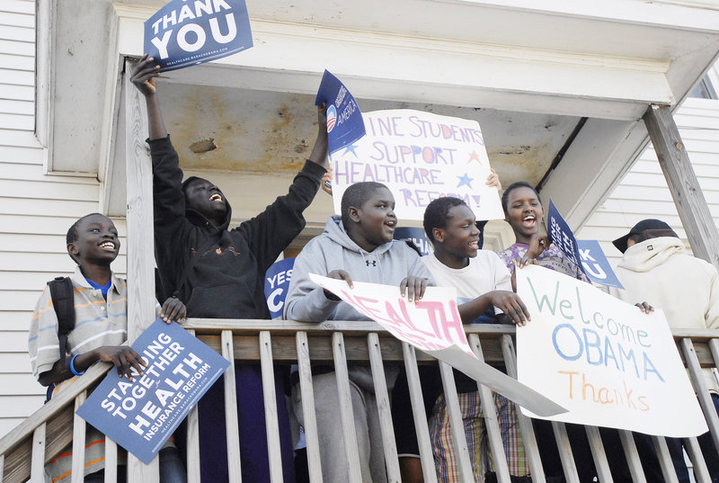 Youths chant “Obama, Obama” on a porch across the street from the Expo. “He took a complicated issue and broke it up in a way everyone could understand it,” said U.S. Rep. Chellie Pingree.