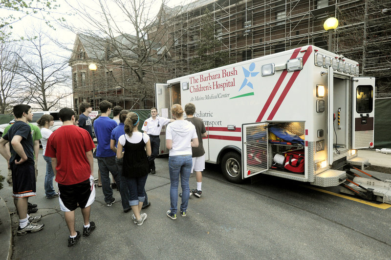 Medical Explorers, a group of high school students interested in the medical field, recently learned about ambulances and rescue equipment at Maine Medical Center. North East EMT Paul Beaupre discusses his company's specialized pediatric transport ambulance.