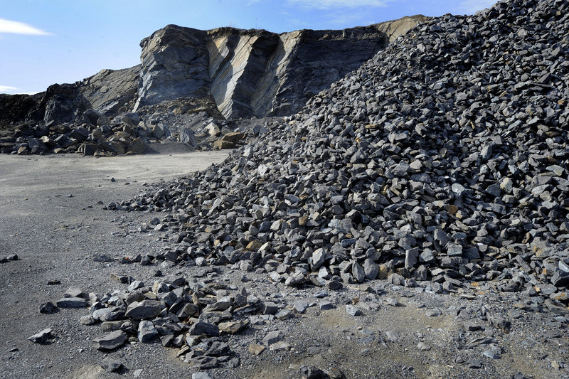 Crushed rock awaits use as rip-rap and other road construction applications.