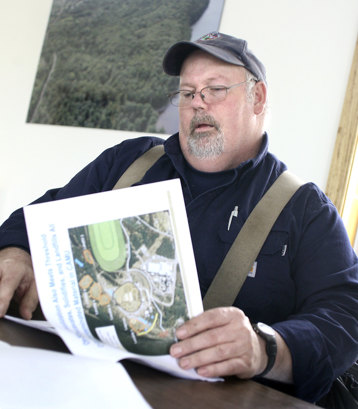 Selectman Howard Grover backs a company plan to remove one of five mercury-laden landfills.