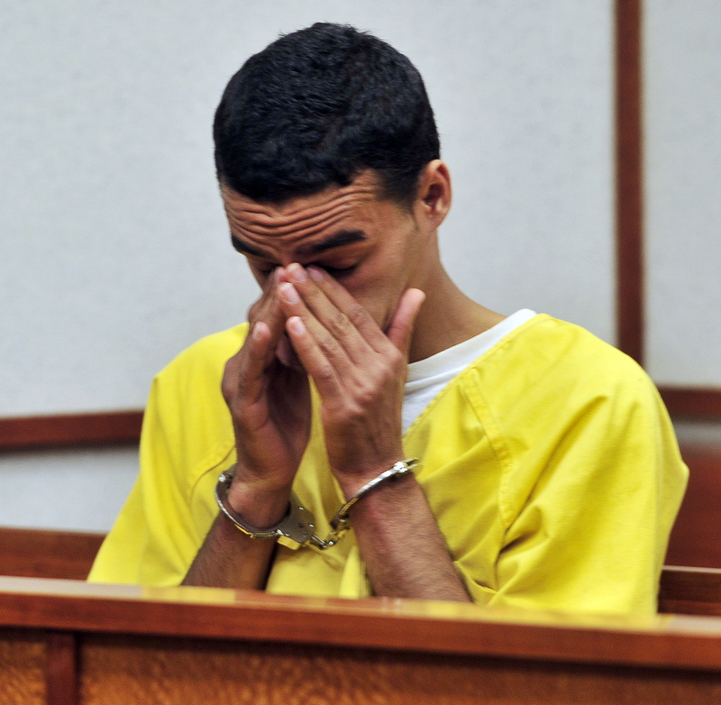 William Googins struggles with his emotions during his appearance Wednesday in Portland District Court. Googins turned himself in to Portland police Monday afternoon.