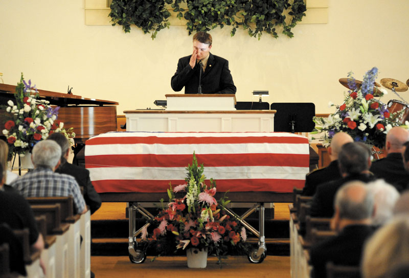 Army Spc. Wade Slack's older brother Jesse wipes a tear as he shares stories about their past Sunday at Slack's funeral at the Blessed Hope Advent Christian Church in Waterville. Slack, 21, specialized in disarming explosives and died of wounds suffered May 6 in indirect fire in Jaghatu, Afghanistan.