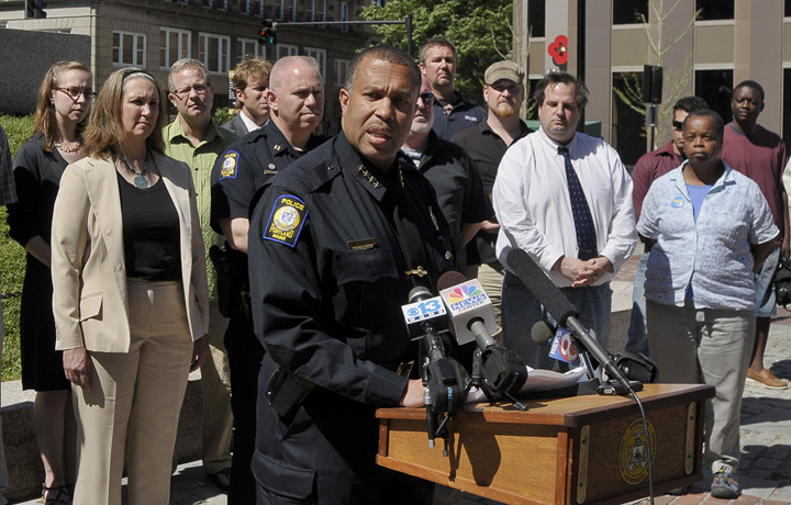 Surrounded by a group of business partners and police in Monument Square, Police Chief James Craig announces a plan to form a new partnership to deal with excessive drinkers and troublemakers in the Old Port.
