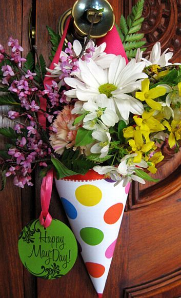 May baskets are traditionally stuffed with flowers and perhaps a small gift and hung from doorknobs.