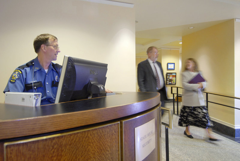 Maine State Police Officer Jim Wright protects state workers in Augusta in this 2007 photo. A reader compliments state employees for helping her incorporate her small business in a smooth, professional way.