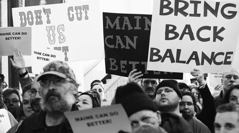 Demonstrators pack the State House on Jan. 12 to protest social-service cuts in the preliminary Maine budget. A nonprofit agency that carries out administrative functions for mental health clinics and hospitals praised legislators for restoring mental health funding to the budget, but a reader wonders why legislators would back new debt after balancing the budget.