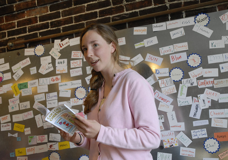 Emily Hollyday, 17, of Cape Elizabeth, above, reads her piece, “Cantaloupe,” at the Telling Room. Below, Lee Reh, 20, of Portland High School reads “Bamboo and Rattan.”