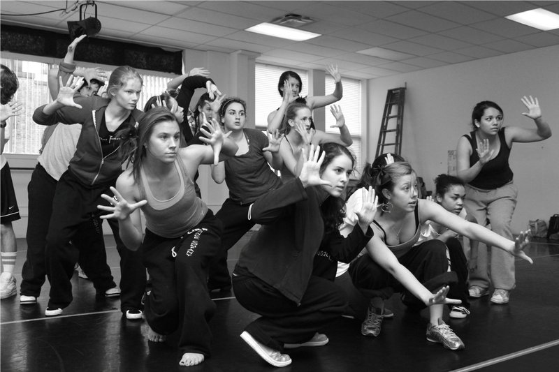 Members of UpBeat Feet Dance Company practice a hip-hop combination for their performance, scheduled for May 22 at Portland High School.