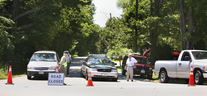 Members of the Scarborough Fire and Police Department closed Ross Street off of Pine Point Road in Scarborough after the ATF raided a home on Sandy Circle in Old Orchard Beach today.