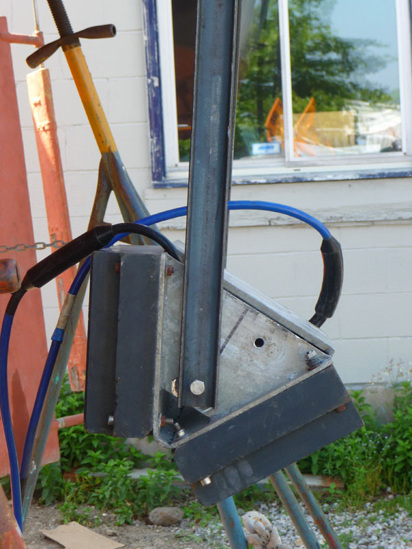 Two views of the swath bathysphere transducer, the back metal box hanging from the side of the sailboat.