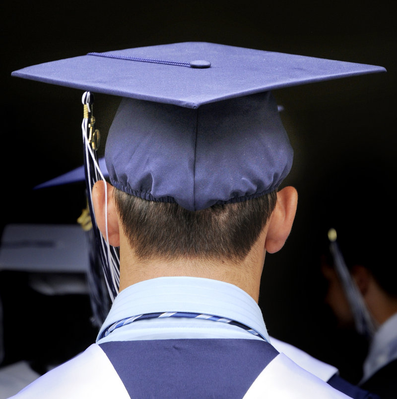 Another senior from Portland High School waits to march into Merrill Auditorium.