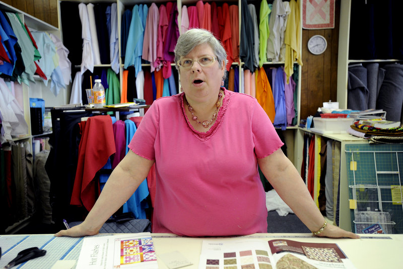 Photos by John Patriquin/Staff Photographer Judy Cole of Augusta is a clerk at the Yardgood Center in Waterville. Paul Lepage’s win in the Republican primary for governor is a good thing, she says, because he takes a grassroots approach to politics.