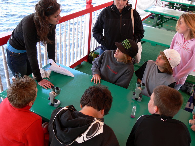 Middle schoolers get a closer look at the base of the food chain, Long Lake plankton, under the microscope.