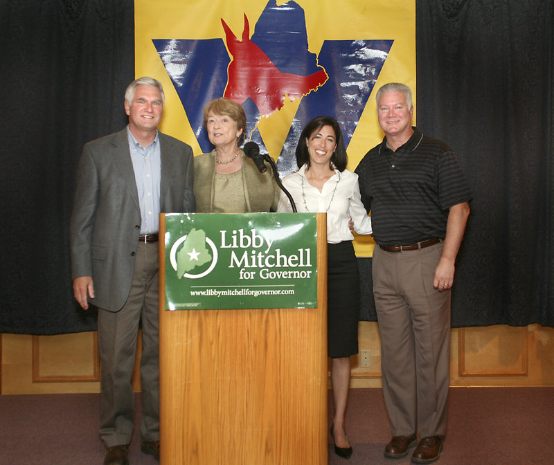 Democrat Libby Mitchell, second from left, stands with Steve Rowe, left, Rosa Scarcelli and John Richardson in South Portland.