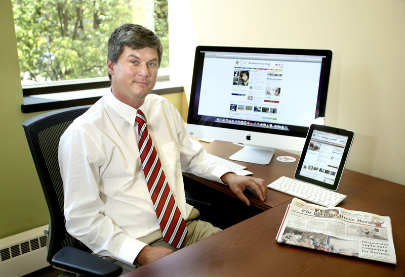 Tim Archambault, MaineToday Media Inc.'s new vice president of new media and digital operations, in his office at One City Center in Portland today.