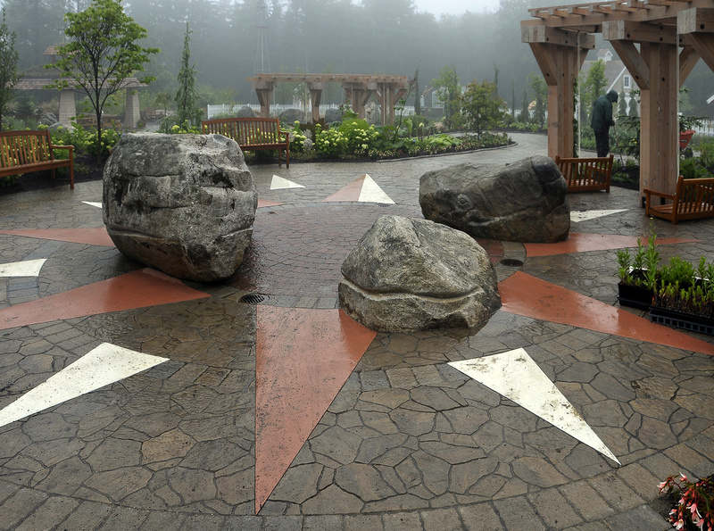 Boulders sculpted to look like the smiling heads of whales will spout water on occasion.