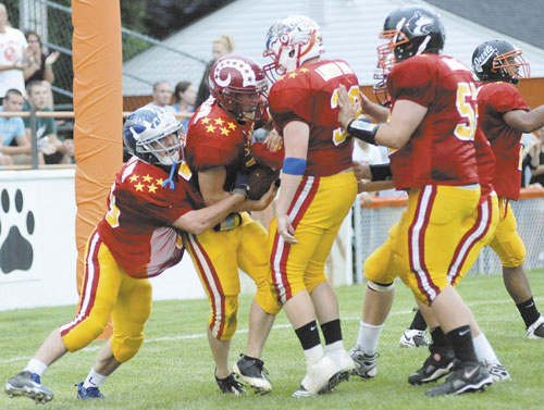 Lonnie Hackett of Bangor saw his high school team reach the Class A championship game last fall, only to lose to Windham. But Saturday, in the Lobster Bowl, it was Hackett scoring the clinching touchdown on a 34-yard run in the fourth quarter at Biddeford and getting surrounded by teammates.