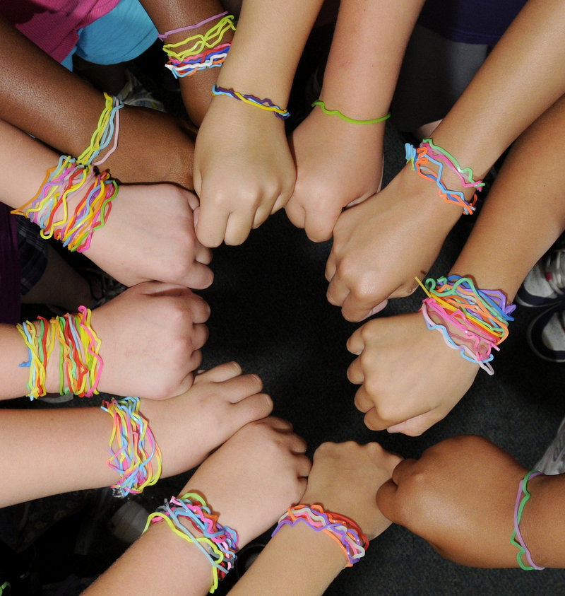 Children display their Silly Bandz at Portland’s Riverton Community Center day camp. Robert Croak, founder of BCP Imports, said annual sales of the bands were $10,000 two years ago but now top $100 million.