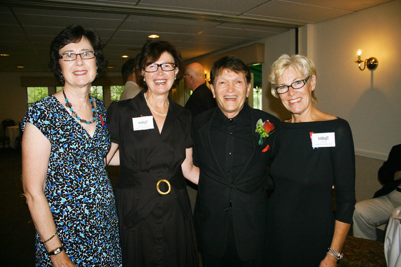 Retiring artistic director Charles Abbott, sharing a laugh with some of the women who made the party possible. They are Nancy Ladd, Barbara Norton and Jan Wilk, chair of the board.