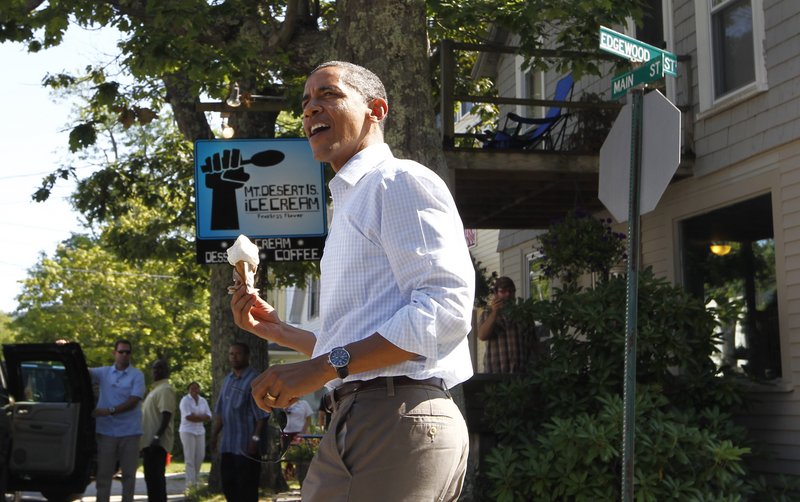 Obama holds a coconut ice cream cone after a visit to Mount Desert Island Ice Cream in Bar Harbor. The first family is scheduled to stay on Mount Desert Island until Sunday morning.