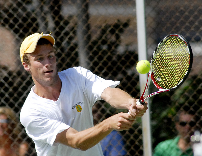 Mike Hill of Topsham returns a shot during Sunday's men's singles final. Hill, the No. 1 seed and defending champion, lost 6-2, 6-4 to Ben Cox.