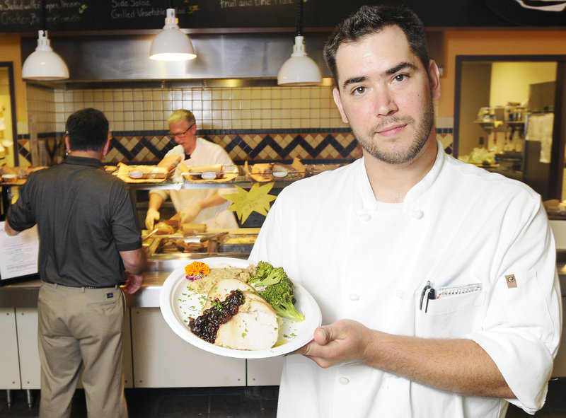 Mike Borland, Black Tie head chef at the Dish Creative Cafe at Pineland Farms, shows off the turkey dinner.