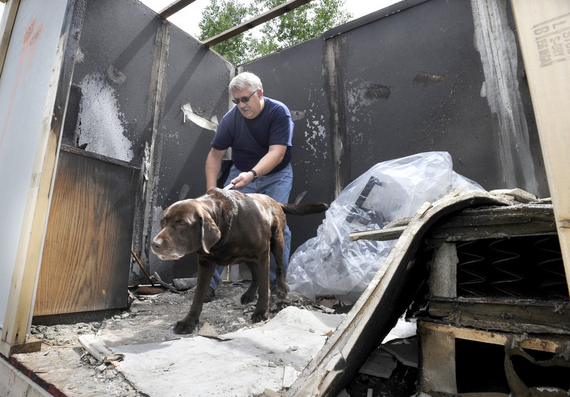 Steve Gallagher, assistant fire chief in Chillicothe, Ohio, puts his dog Winchester to the test. All 14 dogs in this week’s program were originally trained in Maine and then began their jobs around the U.S. and in Canada.