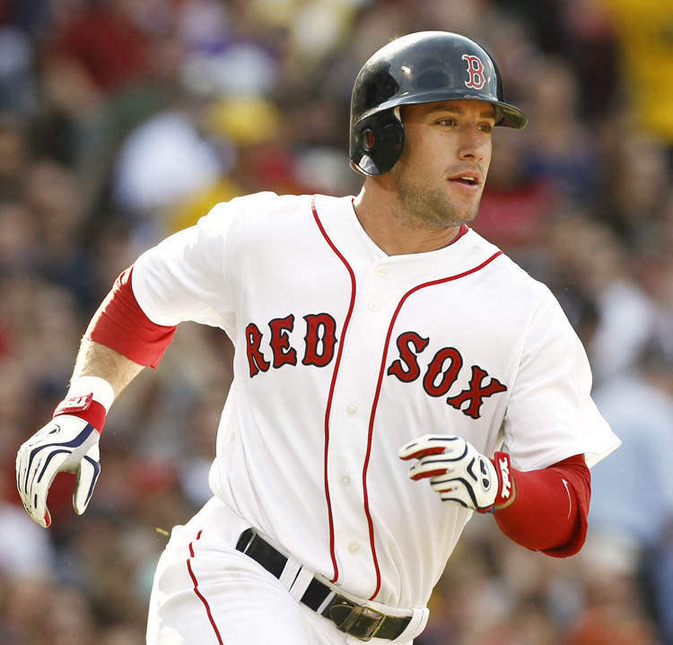 Boston Red Sox's Ryan Kalish watches his first major league hit drop in for a single during the third inning of a baseball game against the Detroit Tigers at Fenway Park in Boston on July 31, 2010.