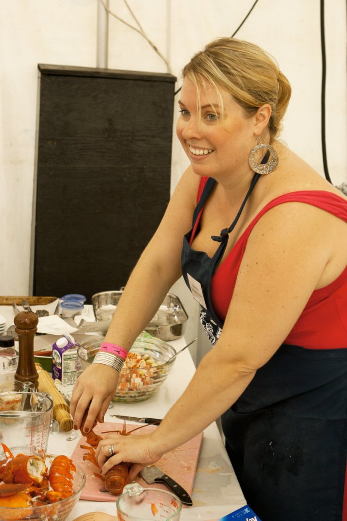 Julia Irace of Portland prepares her winning lobster potpie dish at last year’s Seafood Cooking Contest at the Maine Lobster Festival. Irace will defend her title this year with a lobster eggroll creation.