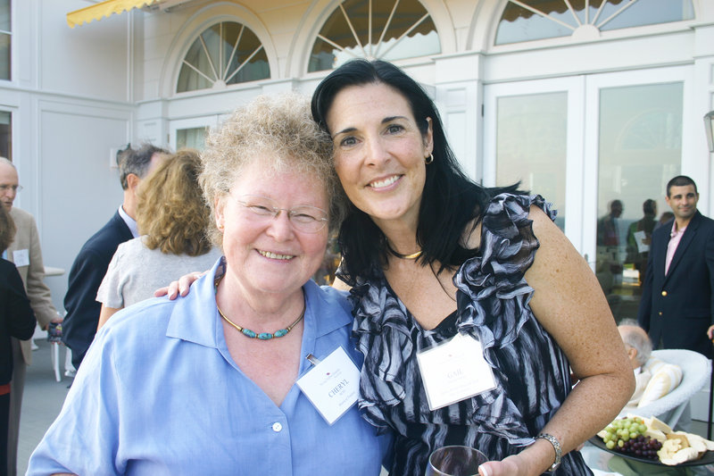 Cheryl Rust, Spring Harbor trustee, and Gail Wilkerson, host committee member.